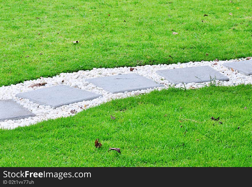 Walk way made by flagstone.