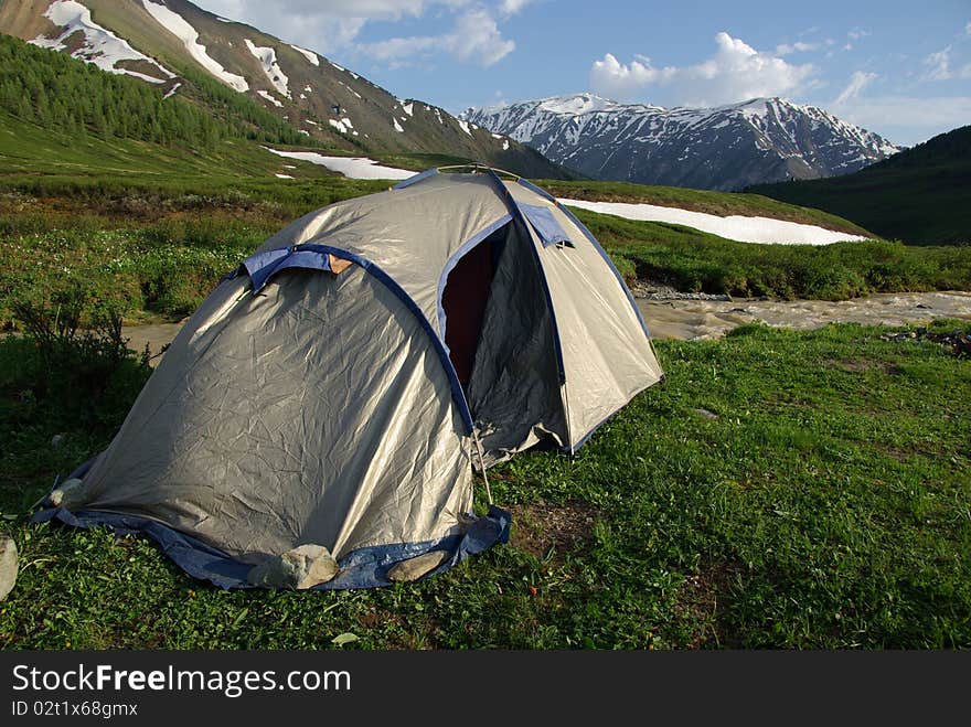 Tourist tent in a mountain landscape