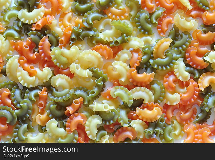 Italian yellow, orange, green macaronis