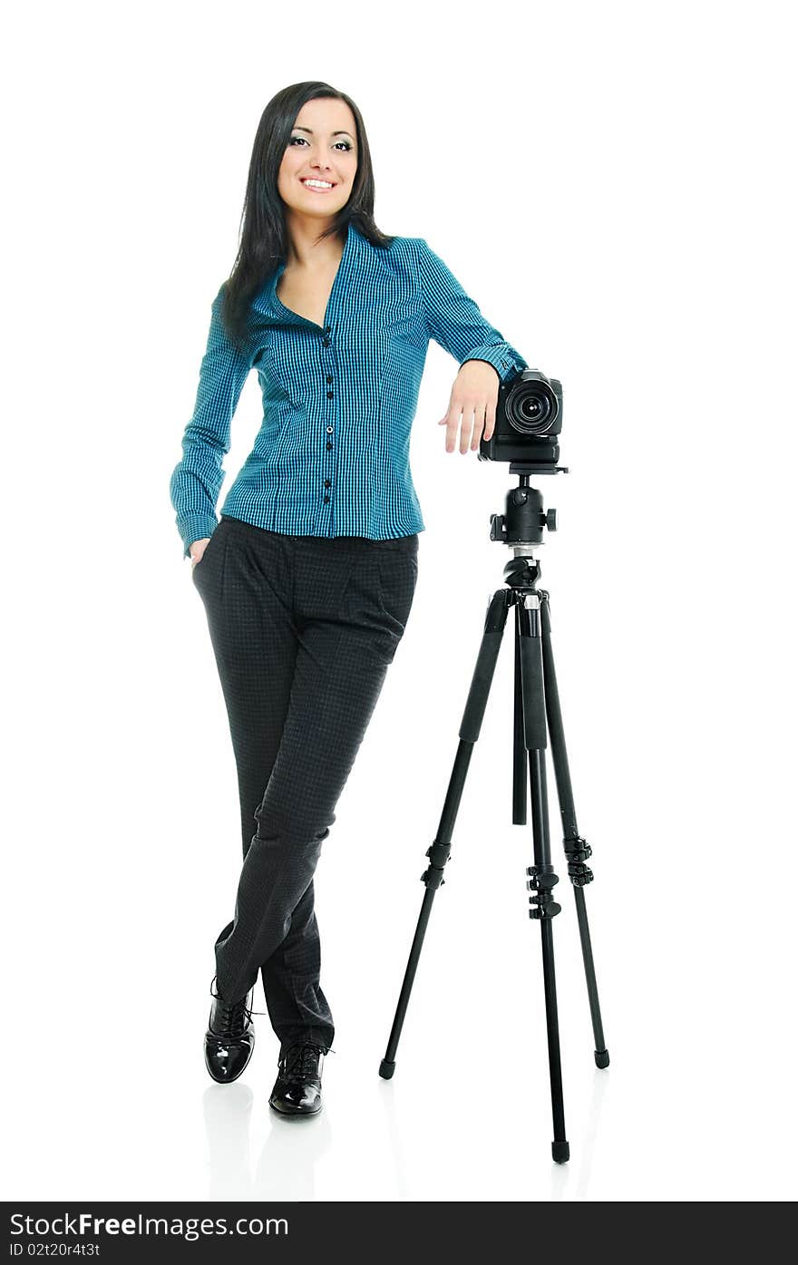 Portrait of beauty brunette with tripod and camera on white. Portrait of beauty brunette with tripod and camera on white