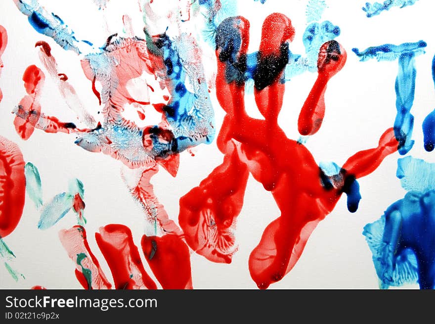 Colorful hand prints on white background