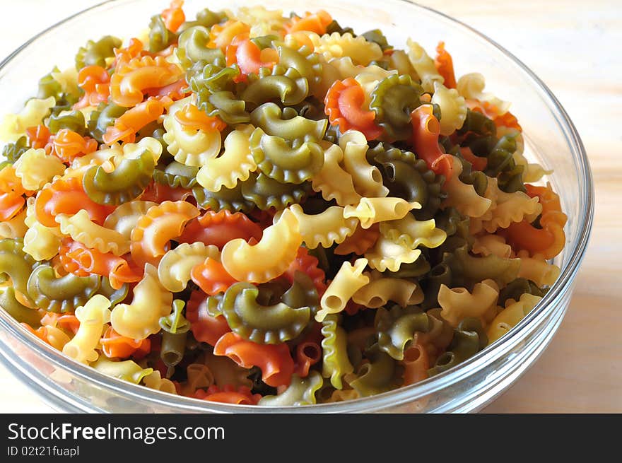 Italian yellow, orange, green macaronis. Italian yellow, orange, green macaronis