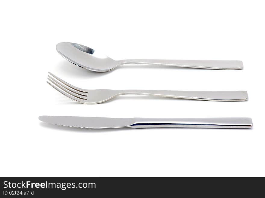 Fork, spoon and knife isolated on white background