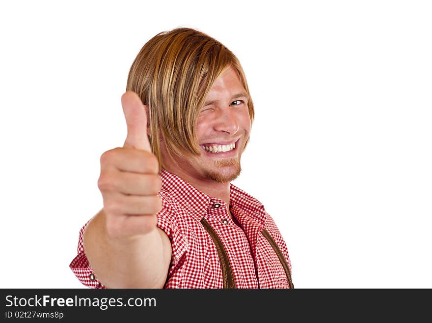 Happy Bavarian man with oktoberfest leather trousers (Lederhose) shows thumb up. Isolated on white background. Happy Bavarian man with oktoberfest leather trousers (Lederhose) shows thumb up. Isolated on white background.