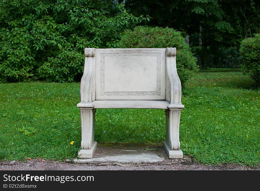 Gray stone chair on the nature backgorund