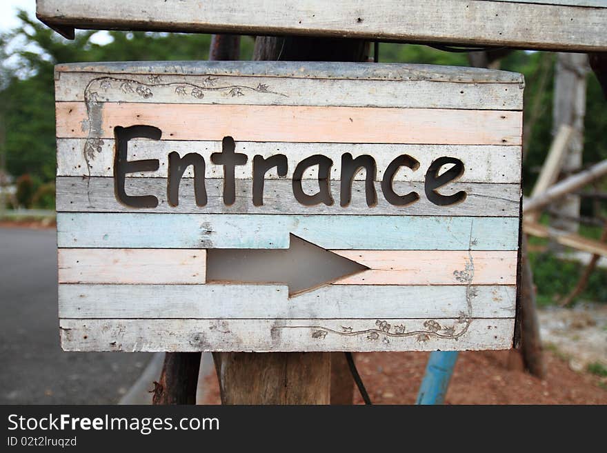 Wood sign car park entrance. Wood sign car park entrance