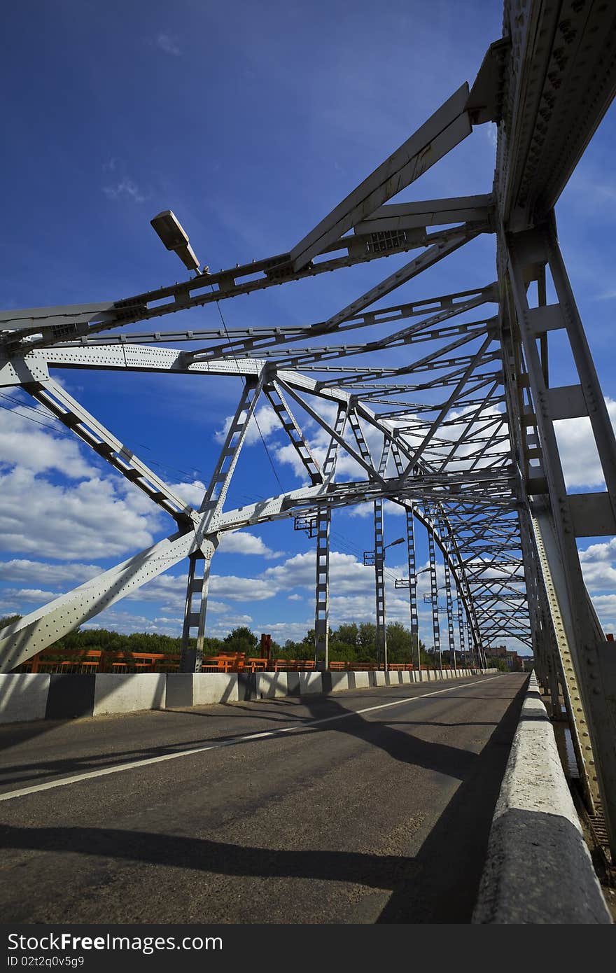 Metal bridge and sky  with clouds. Metal bridge and sky  with clouds