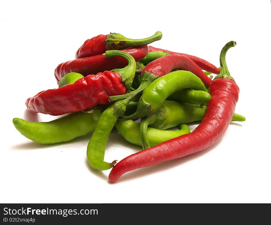 Green and red peppers closeup isolated shot. Green and red peppers closeup isolated shot