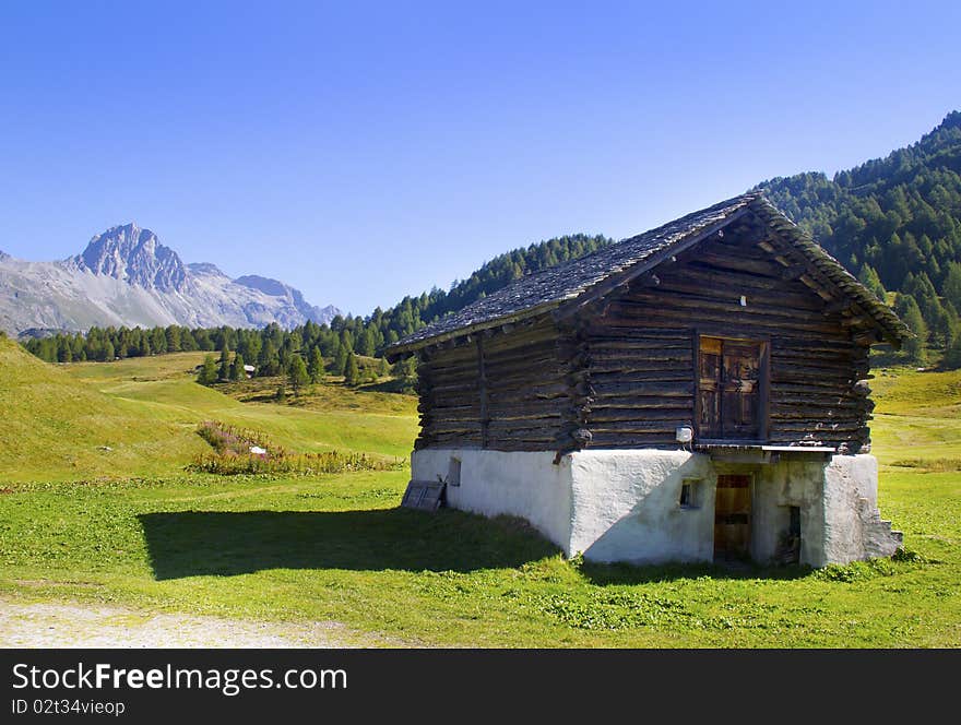 Mountain house in the middle of the lawn. Mountain house in the middle of the lawn