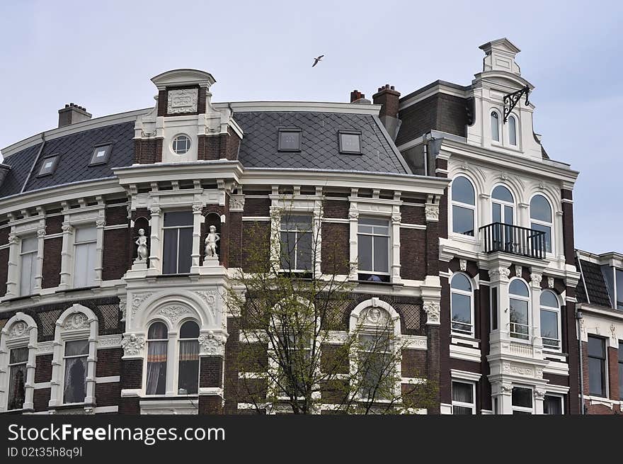 This is Amsterdam building, wiew from the channel, tourism, Europe, Amsterdam. This is Amsterdam building, wiew from the channel, tourism, Europe, Amsterdam