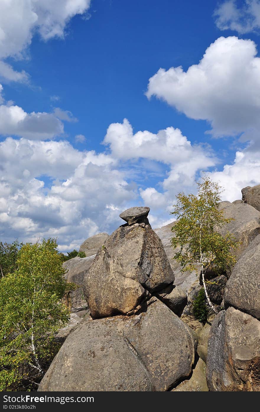 Rocks over wood.