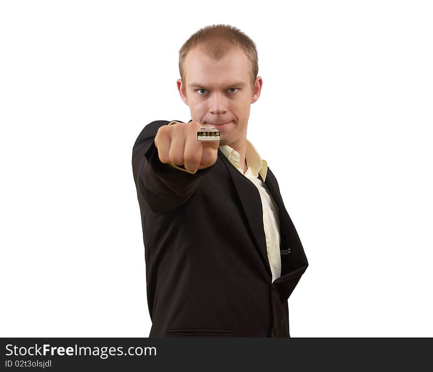 Young businessman in suit pointing in you with USB on his finger, isolated on white. Modern technology concept. Young businessman in suit pointing in you with USB on his finger, isolated on white. Modern technology concept