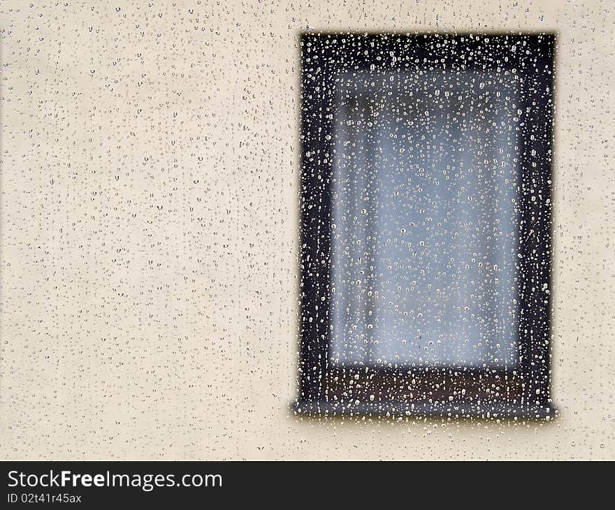 The photo shows a dripping wet window on a rainy day