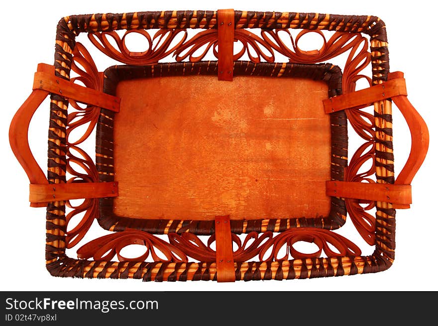 Top view looking into a decorative basket in fall colors over white background. Top view looking into a decorative basket in fall colors over white background.