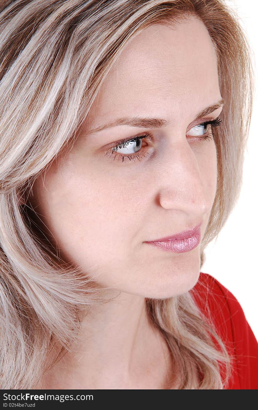 An closeup portrait of a young beautiful woman with white blond
hair and red dress, looking away from the camera, on white background. An closeup portrait of a young beautiful woman with white blond
hair and red dress, looking away from the camera, on white background.