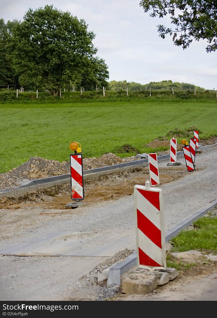 Reconstruction signs and barriers in the middle of the road. Reconstruction signs and barriers in the middle of the road