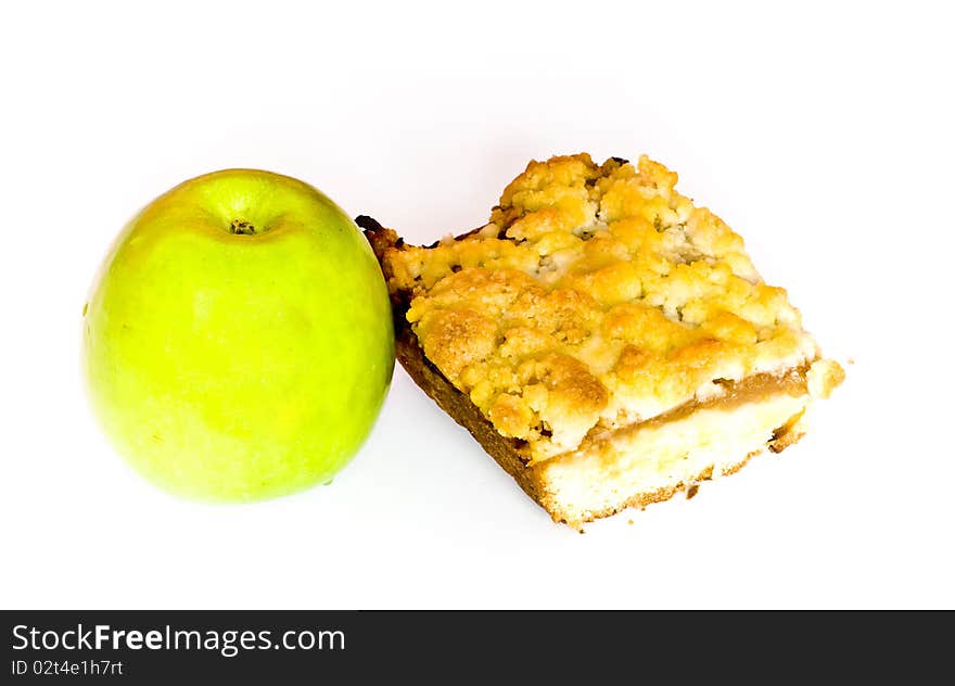 Green apple and apple pie isolated on white