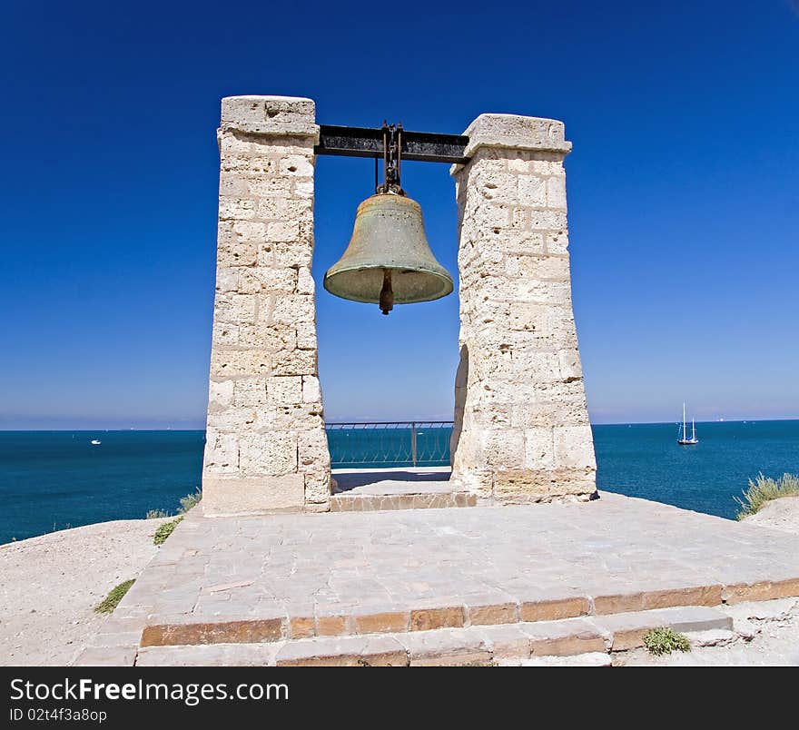 Ancient bell on the seaside