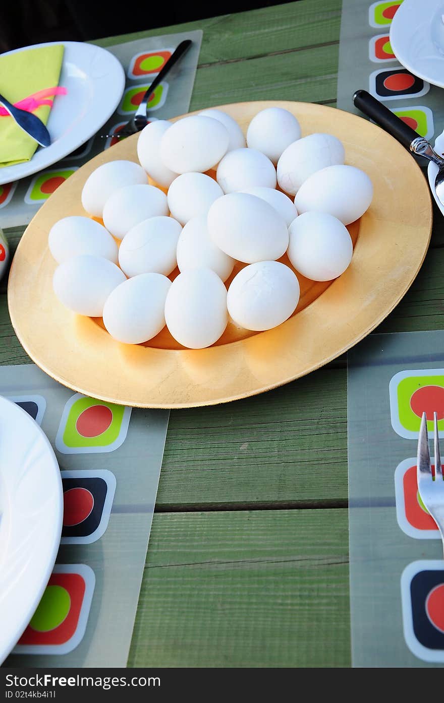 A picnic table full of food. A picnic table full of food