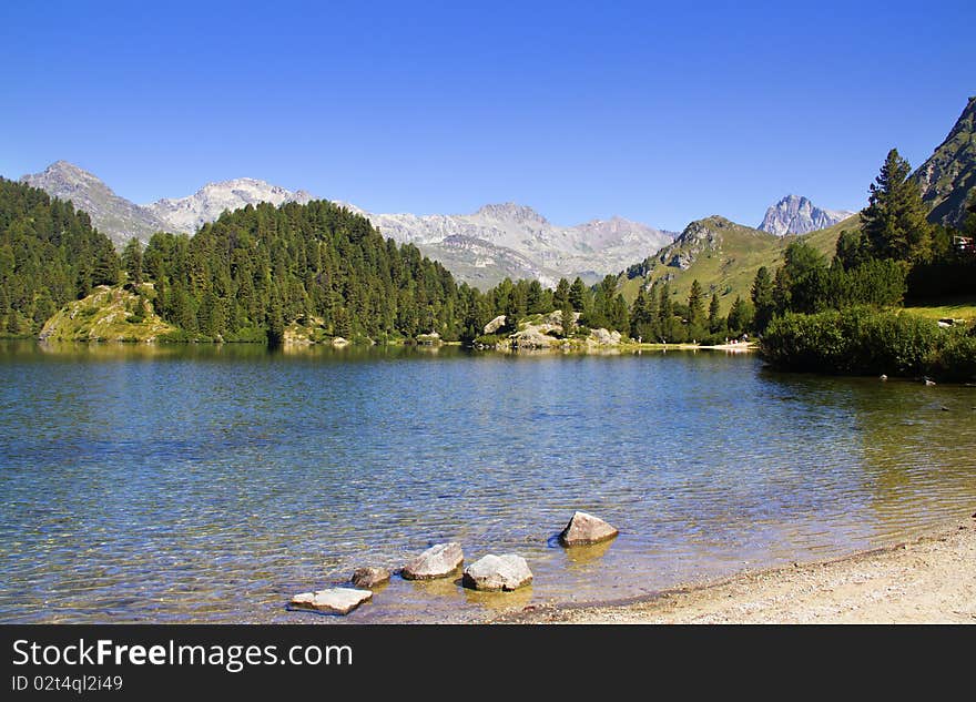 Alpine lake Cavloc Engadine in Switzerland