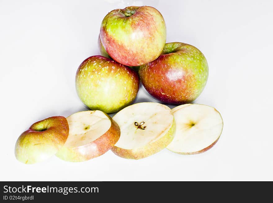 Apples and apple slices isolated on white background