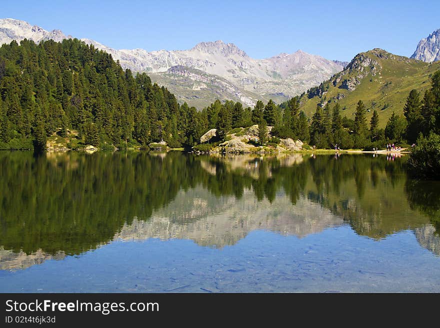 Alpine lake Cavloc Engadine in Switzerland