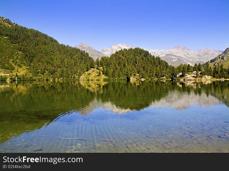 Alpine lake Cavloc Engadine in Switzerland