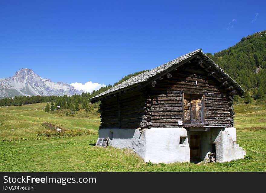 Mountain house in the middle of the lawn. Mountain house in the middle of the lawn