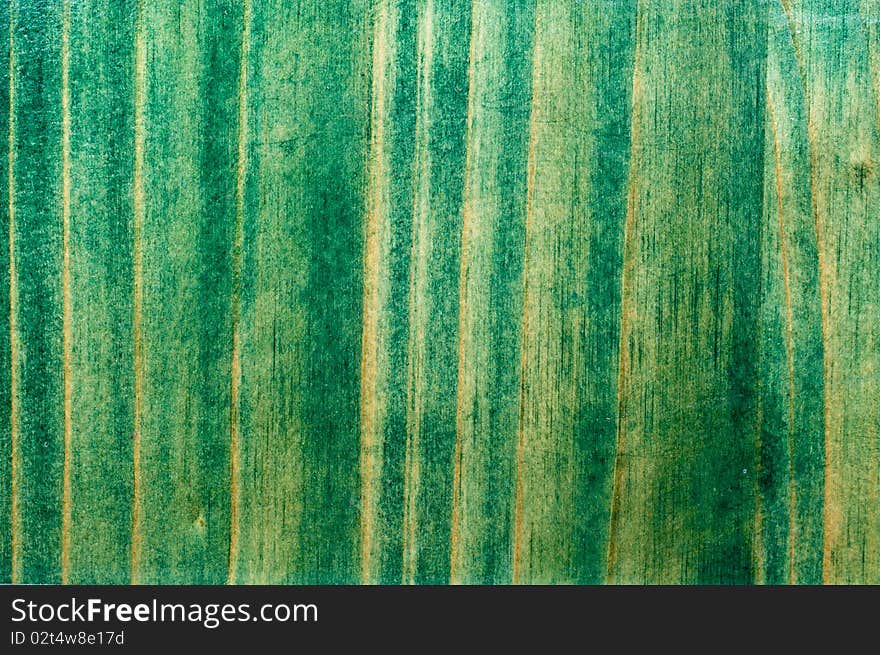 Texture of an old wooden fence green