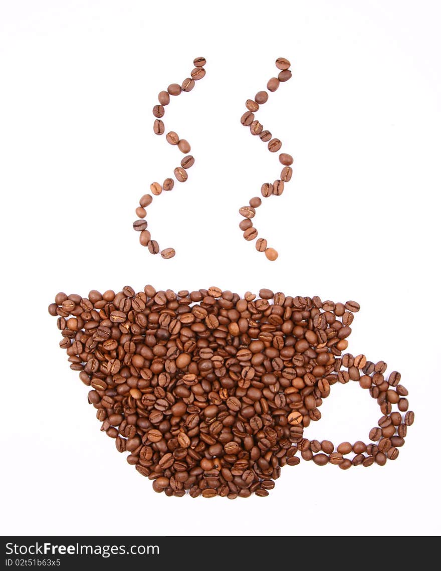 Cup of coffee shape made of coffee beans on white background. Cup of coffee shape made of coffee beans on white background