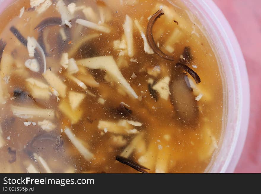 Chinese vegetarian sharks fin soup cooked with various vegetables, mushrooms, and mock meat. For food and beverage, and international cuisine concepts.