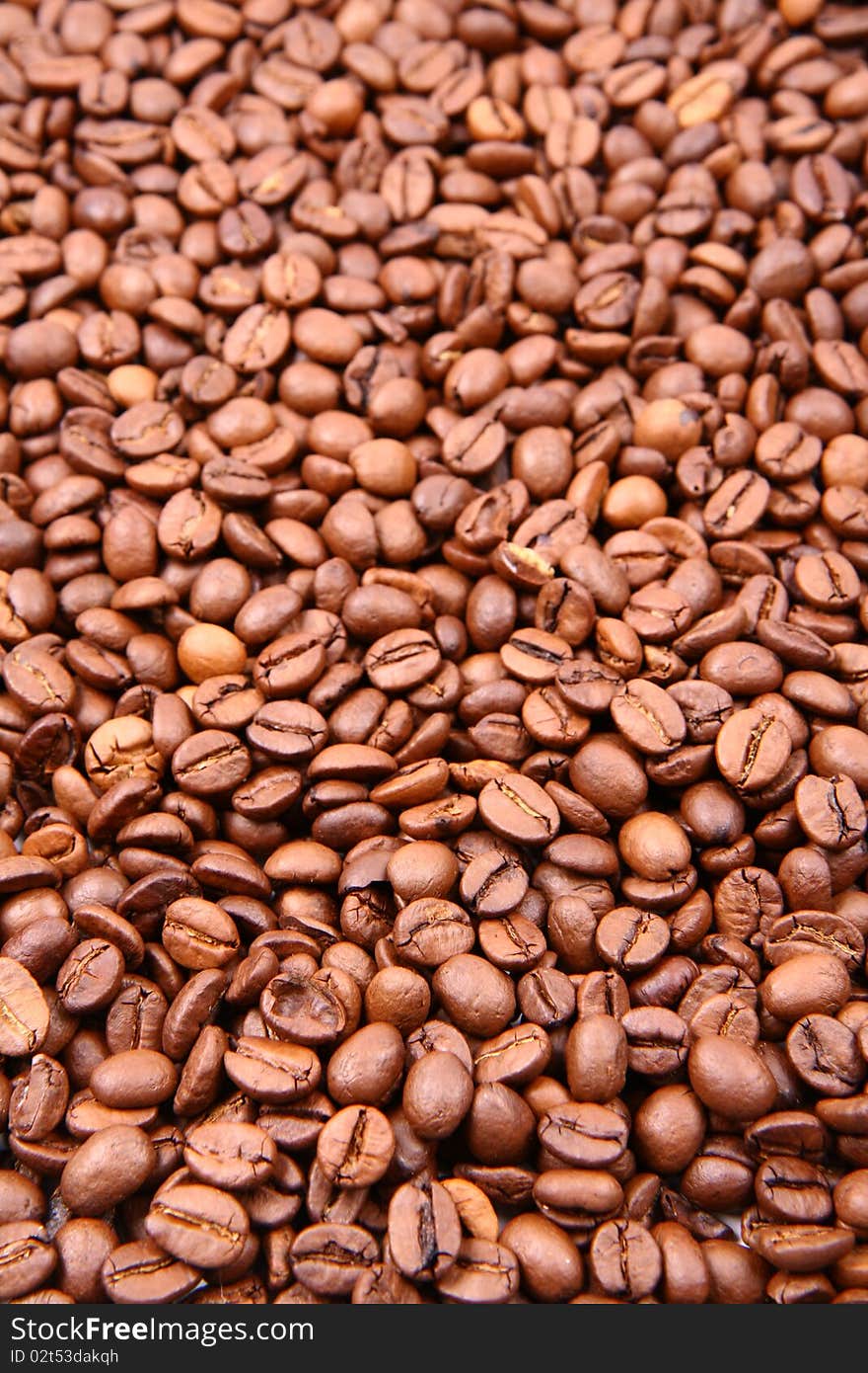 Coffee beans in close up - background