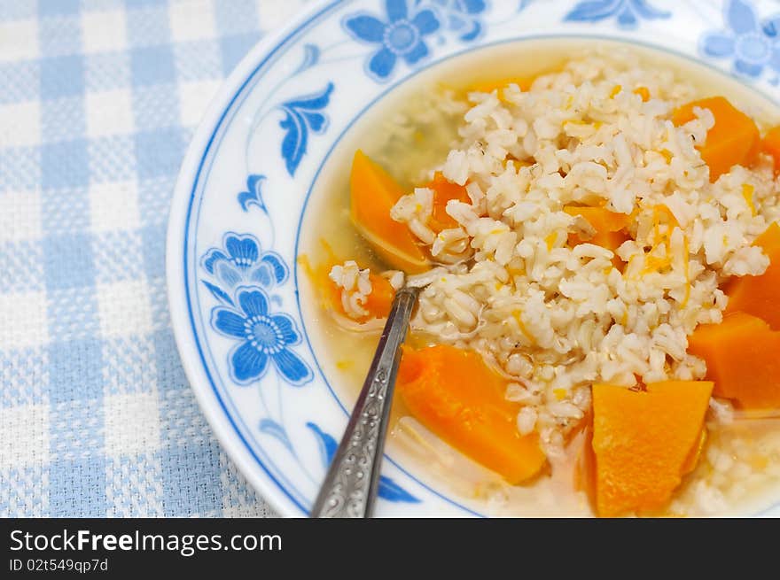 Simple and healthy porridge cooked with sweet potato. For diet and nutrition, healthy eating and lifestyle concepts.