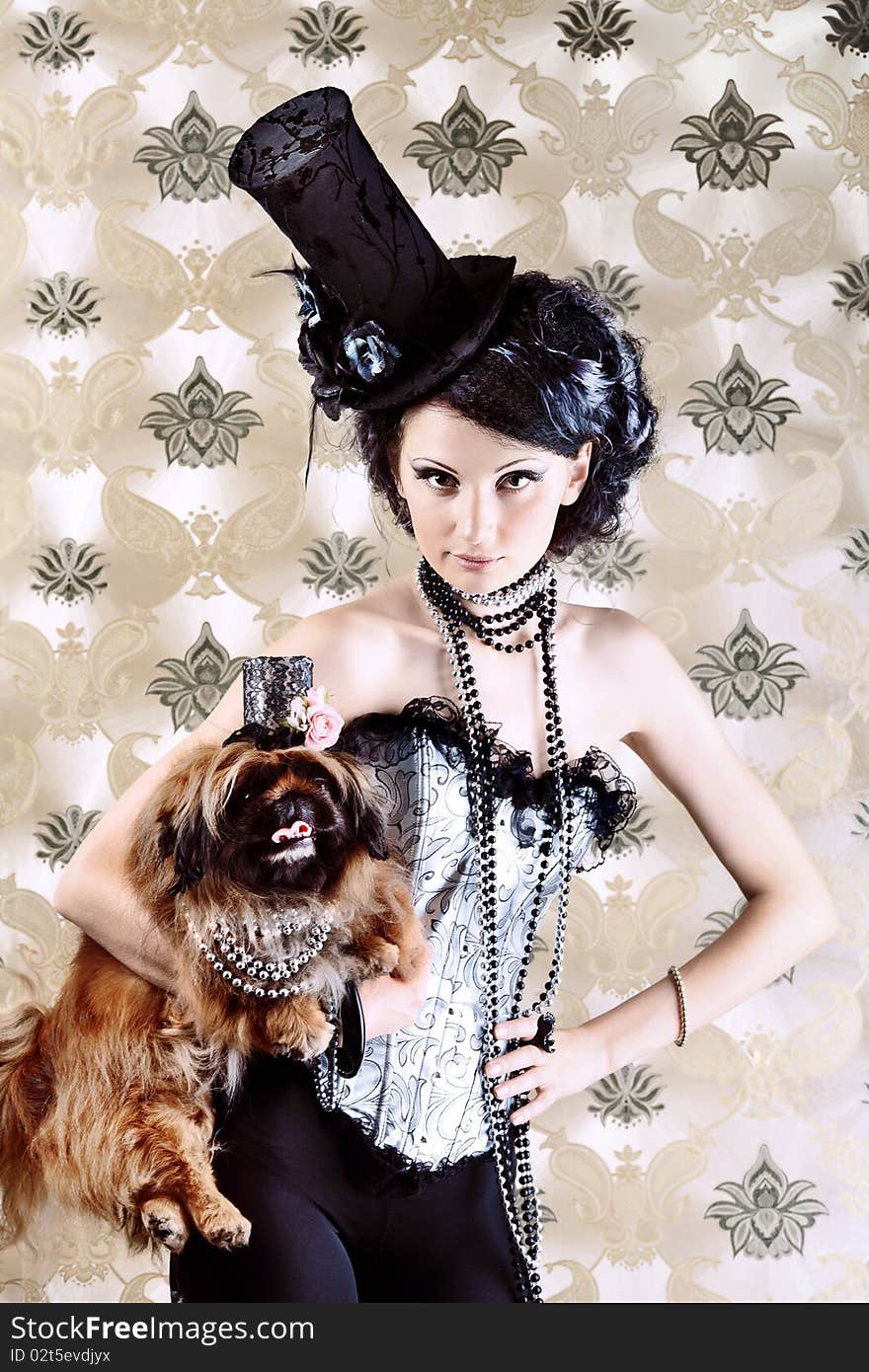 Portrait of a fashionable lady with a dog over vintage background. Portrait of a fashionable lady with a dog over vintage background.