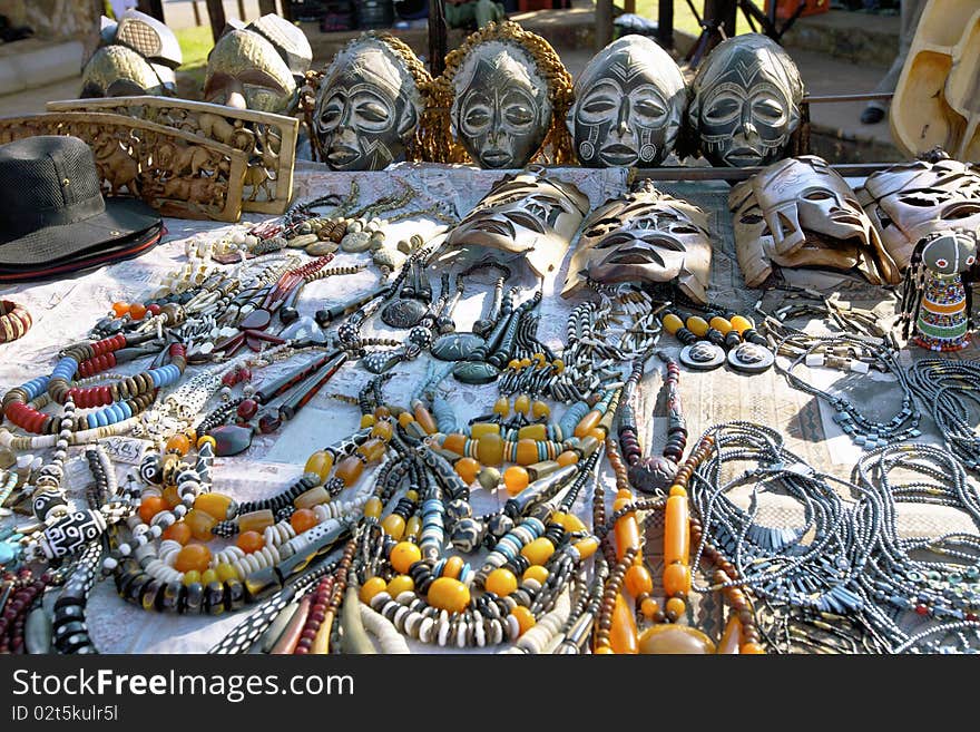 South Africa market stall with masks, necklaces for toursits