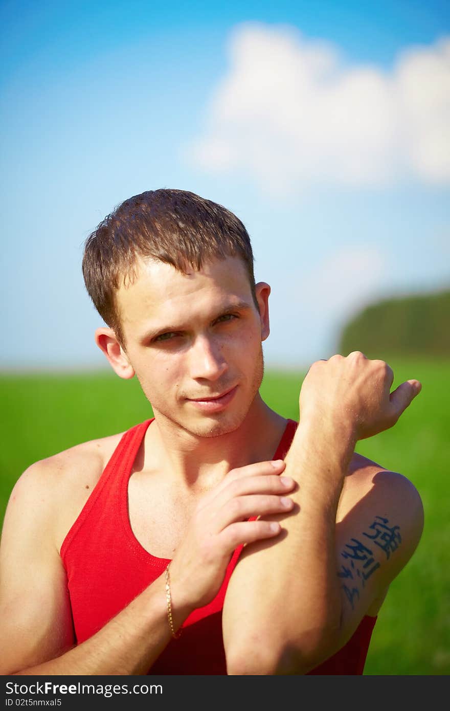 Portrait of a young man in the field