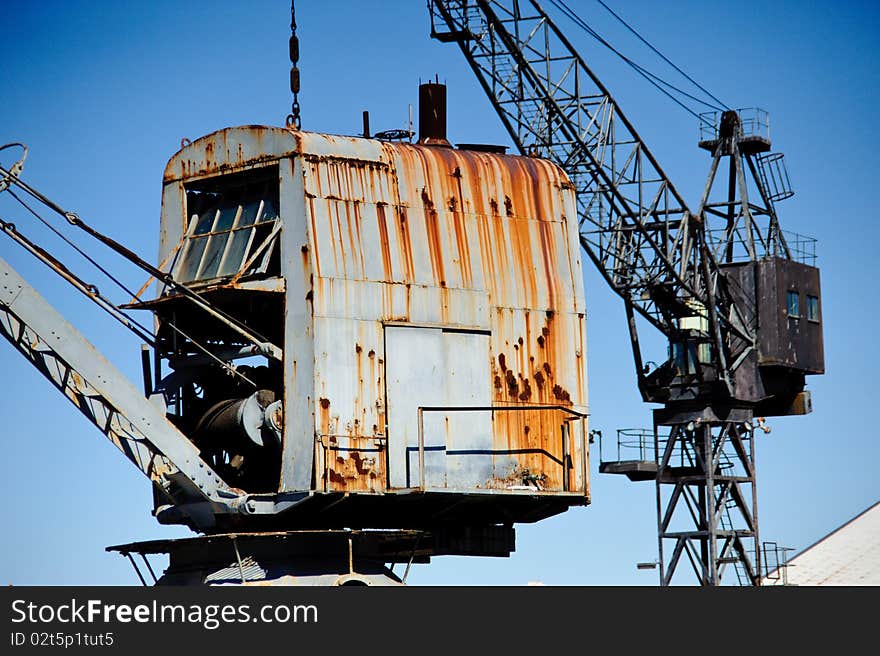 Old cranes in an abandoned shipyard. Old cranes in an abandoned shipyard.