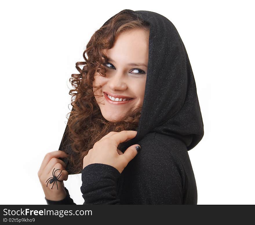 Portrait of a young smiling woman in a hood.