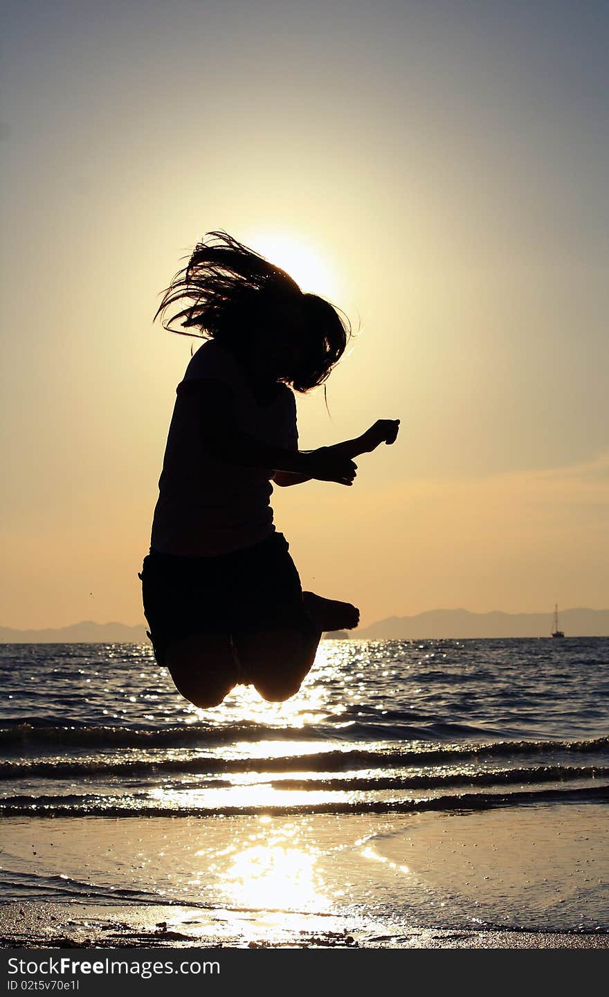 Women jumping at beach in thailand. Women jumping at beach in thailand