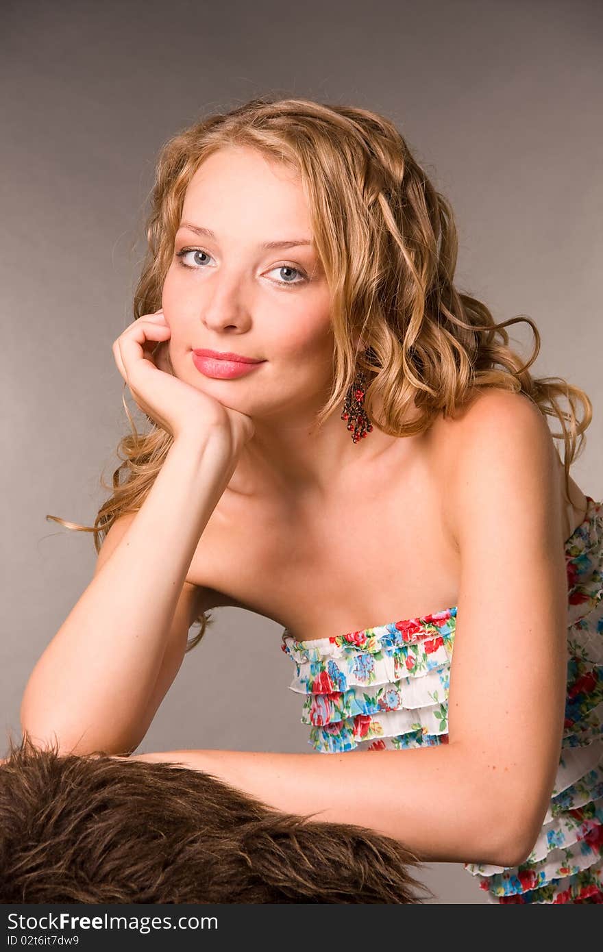 Portrait of beautiful young woman of blonde