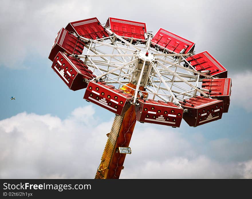 Roundabout on background of the dramatic cloudy sky. Roundabout on background of the dramatic cloudy sky