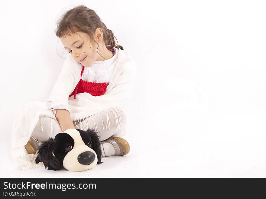 Young girl sitting with her mascot.