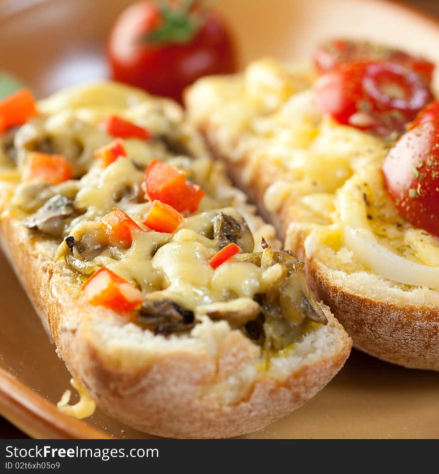 Crostinis with mushrooms,pepper and tomatoes