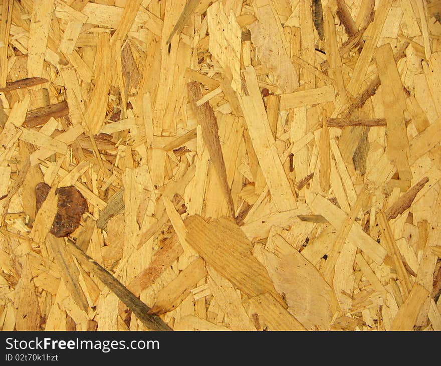 Photograph of a textured wood shavings clear