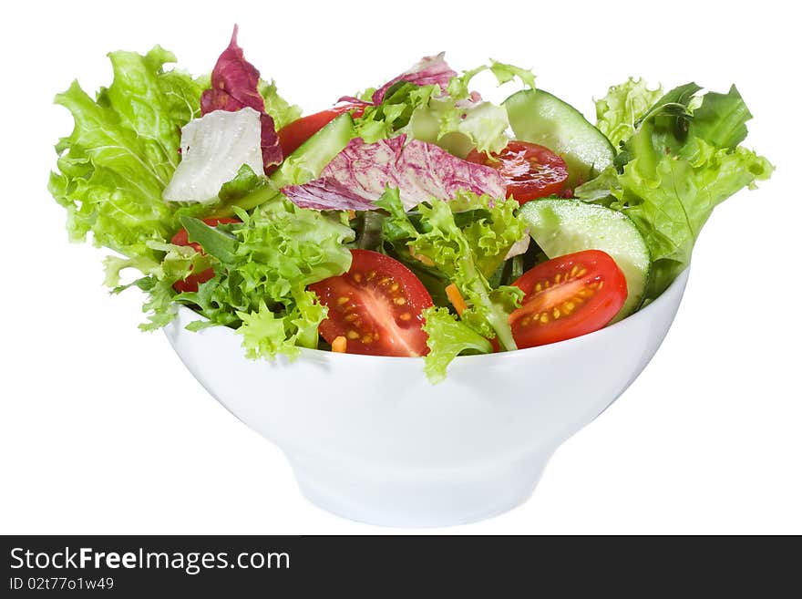 Salad with vegetables on white background