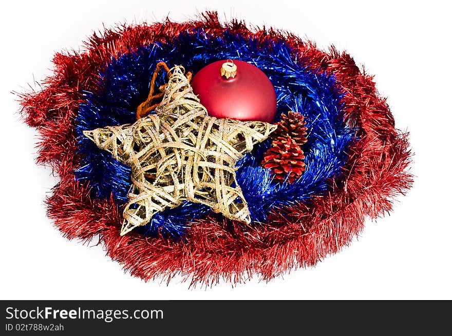 Christmas Decorations Lying On Red And Blue Chains