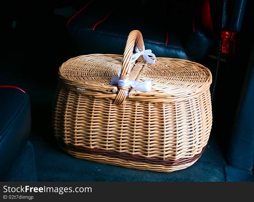 Vintage woven basket on a dark background