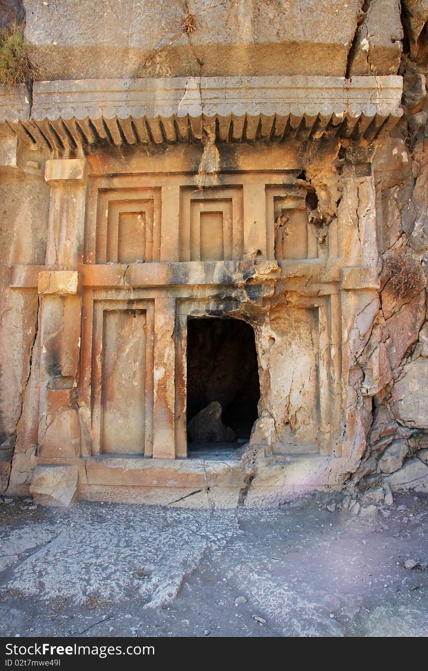 A ancient opened tomb in the rock