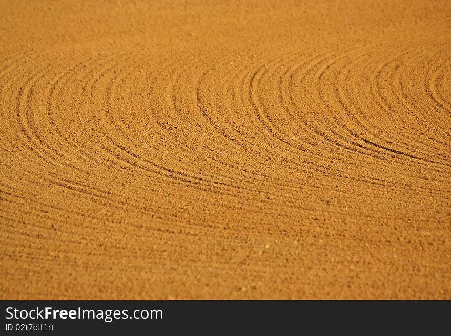 A Baseball infield sandy background texture. A Baseball infield sandy background texture