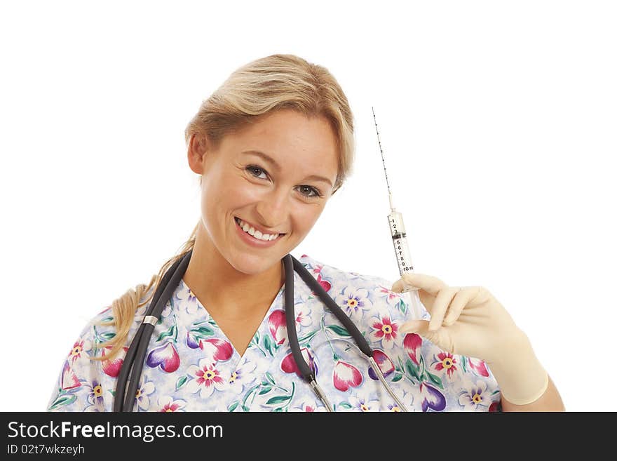 Humorous Portrait of young nurse with stethoscope and syringe